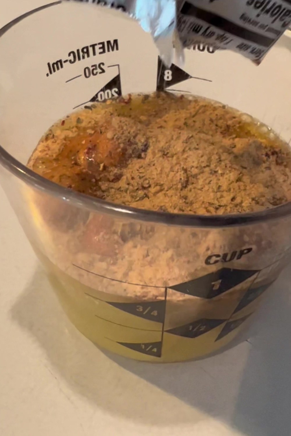 a bowl contain juice and Weber seasoning